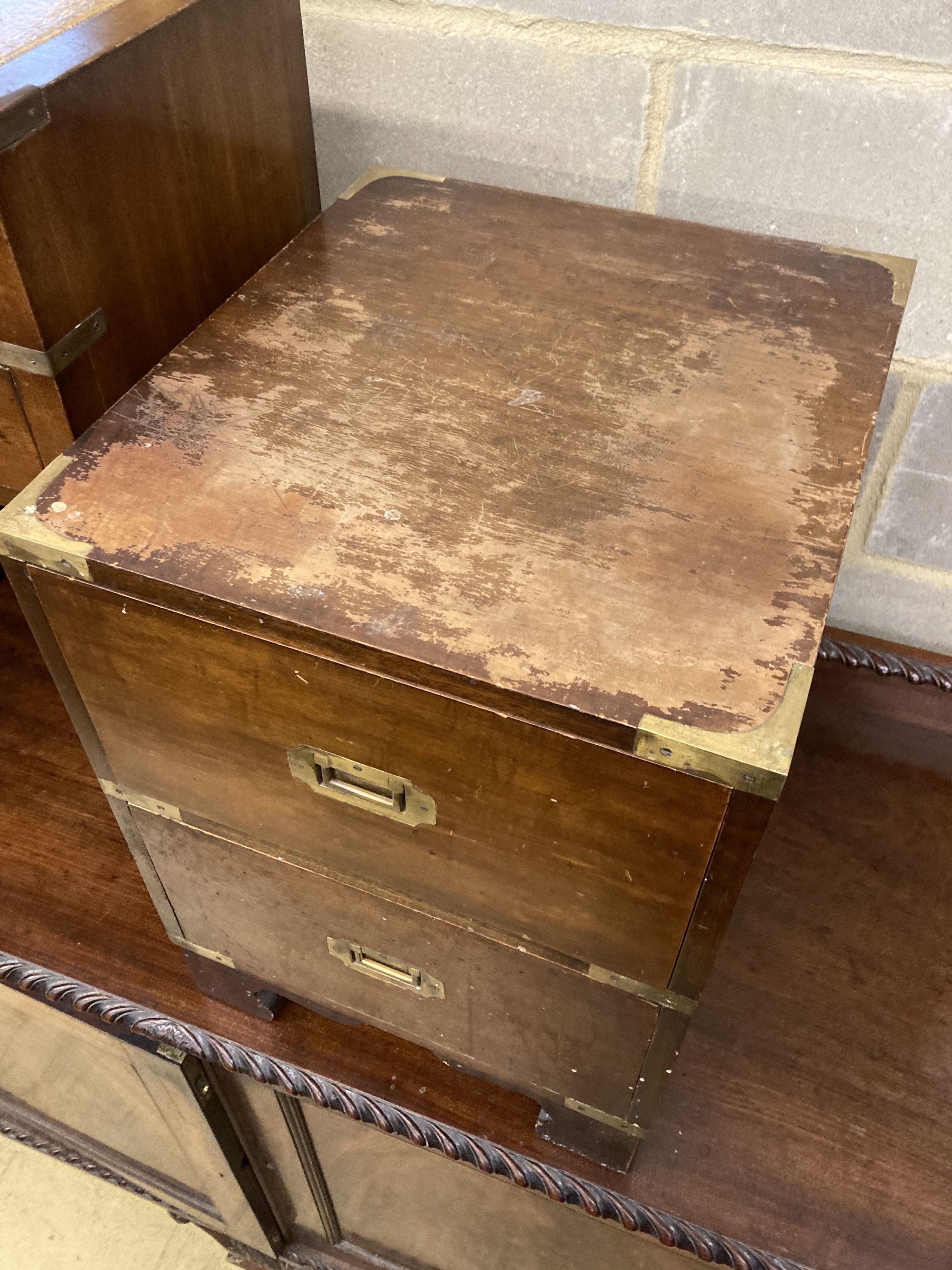 Three military style mahogany two drawer bedside chests, larger width 40cm, depth 46cm, height 56cm